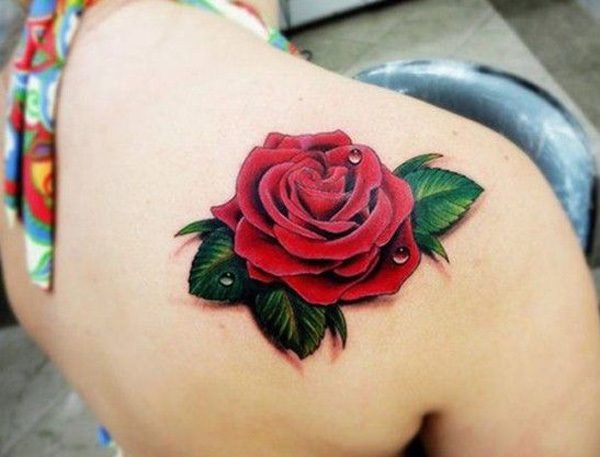 Rose tattoo on woman’s shoulder