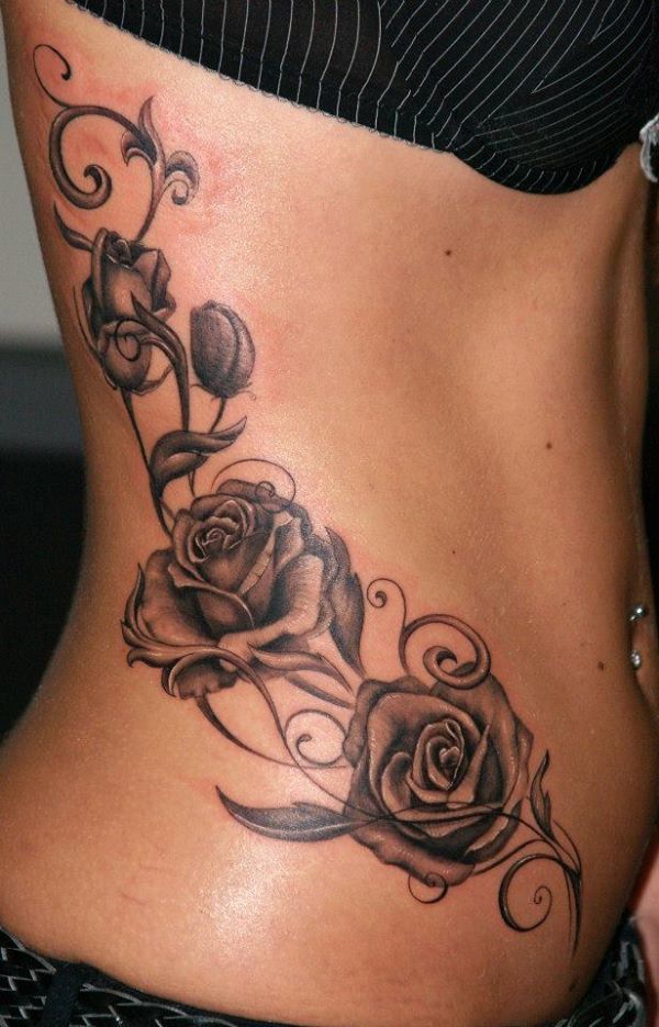 Side black rose tattoo