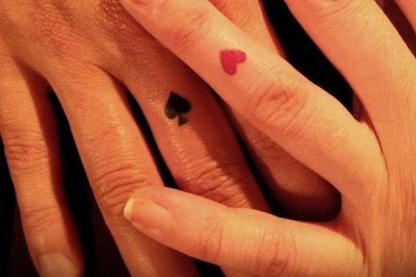 Reversed Heart Matching Couple Tattoos