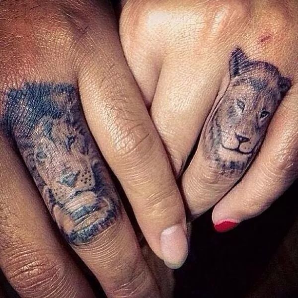 Lions on Ring Finger Tattoos