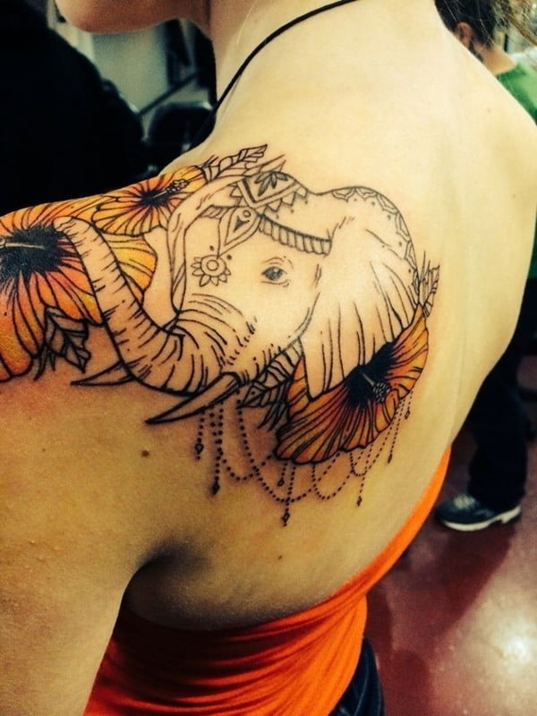 A large realistic elephant tattoo on the back