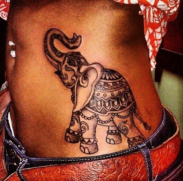 A cool crowned elephant tattoos on the stomach