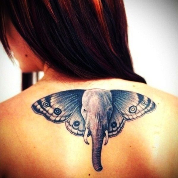 A beautiful elephant head tattoo on a lady’s back