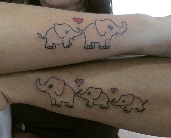 Beautiful and small elephant arm tattoo