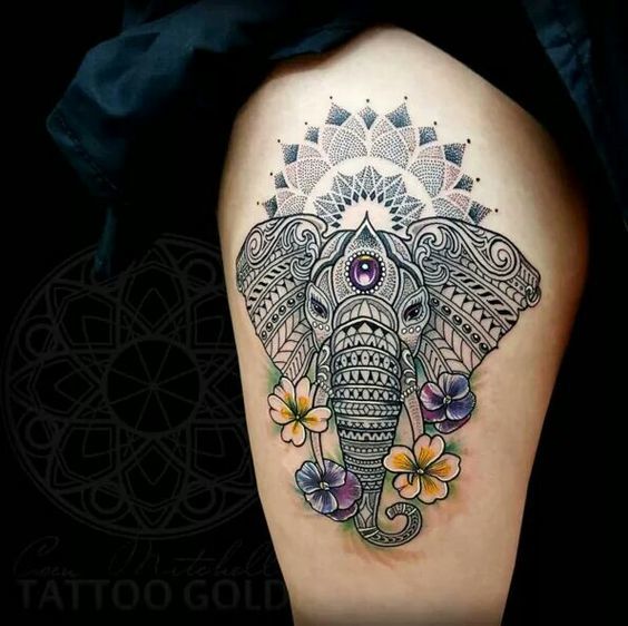 Lovely Elephant Thigh Tattoo with Flowers and Prized Gem