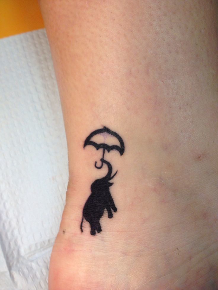 Elephant Outline Tattoo with Umbrella