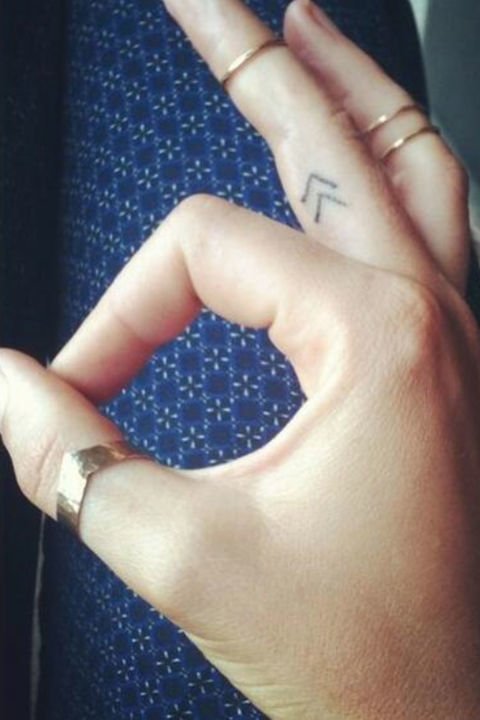ring finger tattoo