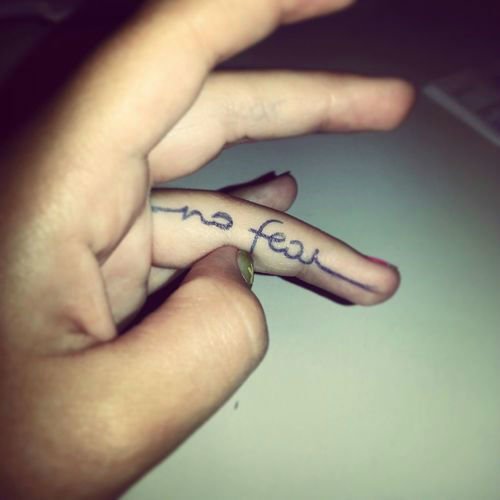 inner finger tattoo, matching finger tattoos