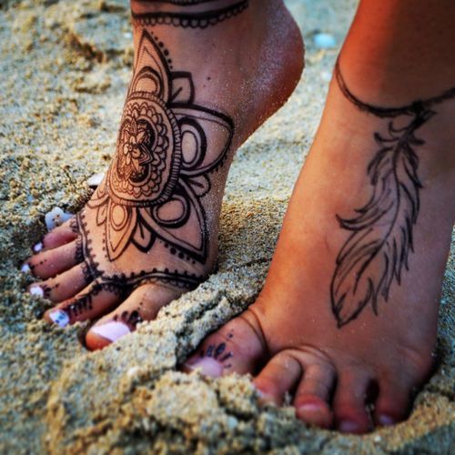 foot tattoo by tattoo artist