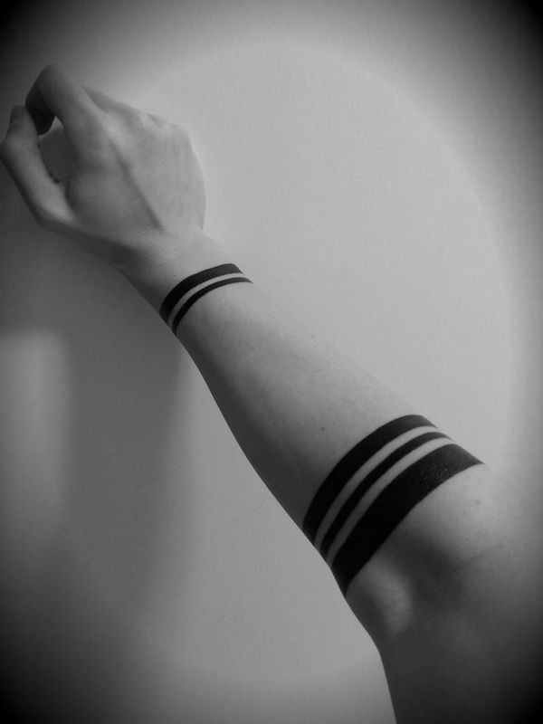 Wristband tattoo on wrist