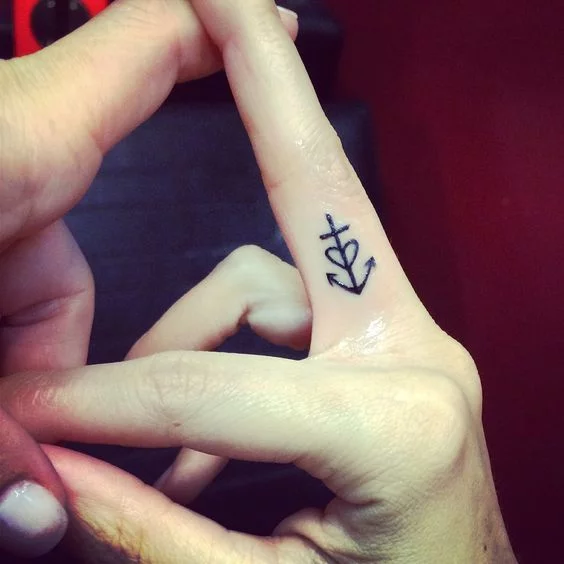 Matching anchor and heart tattoo idea for a couple  Tattoogridnet