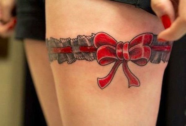 lower back bow tattoos