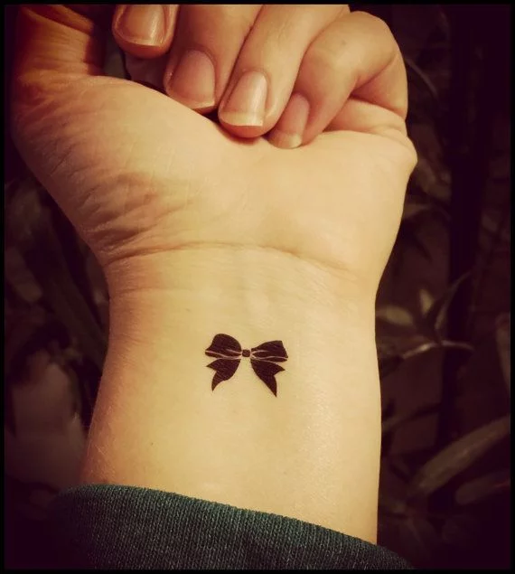 60 Sexy Bow Tattoos that will Definitely Turn Heads in 2022