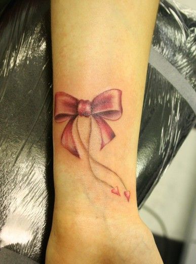 Bow Tattoos - Inked Magazine