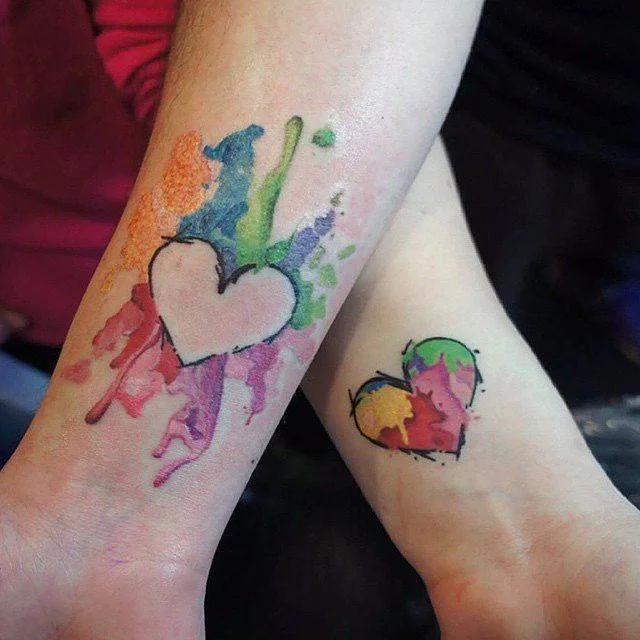 Work of Art Heart Couple Tattoos