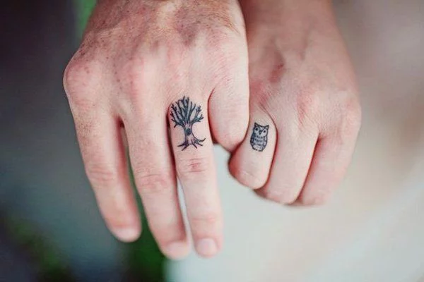 Tiny Tree and Owl on Knuckle Couple Finger Tattoos