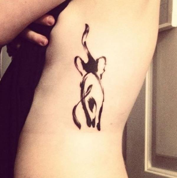 A thinly elephant tattoos on the side belly