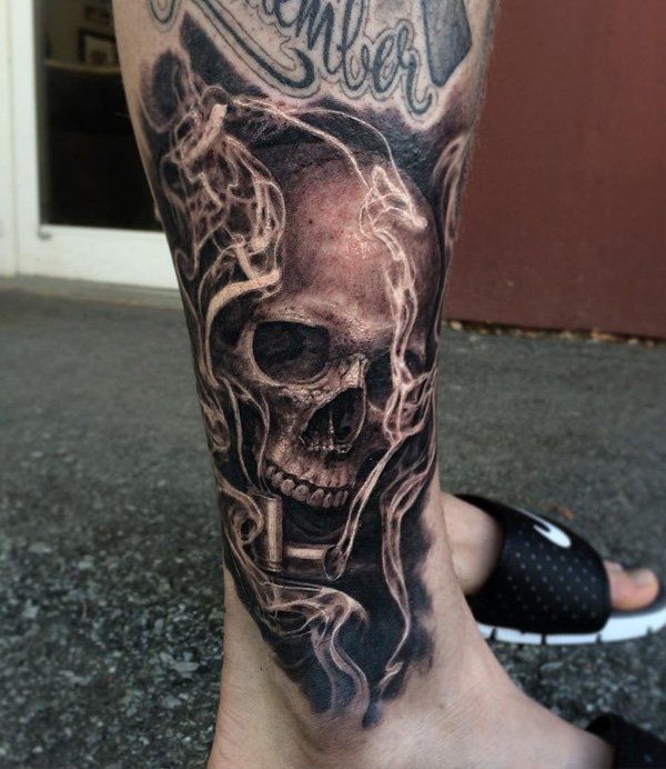 Lower right leg skull tattoo