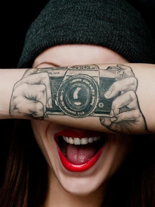 Camera tattoo on wrist