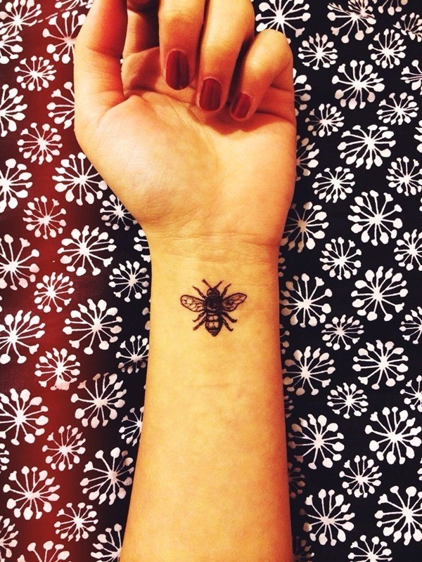 Tiny wrist tattoos
