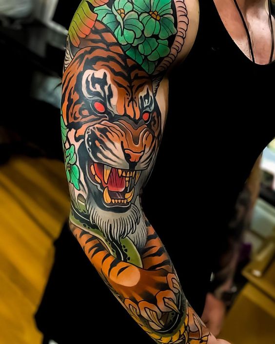 Colorful Botanical Tiger and Snake Scene Sleeve Tattoo