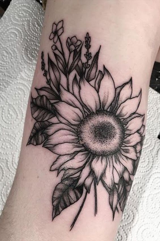 tiny sunflower tattoo