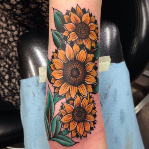 hip sunflower tattoo