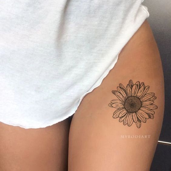 delicate sunflower tattoos