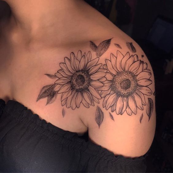 minimalist sunflower tattoo