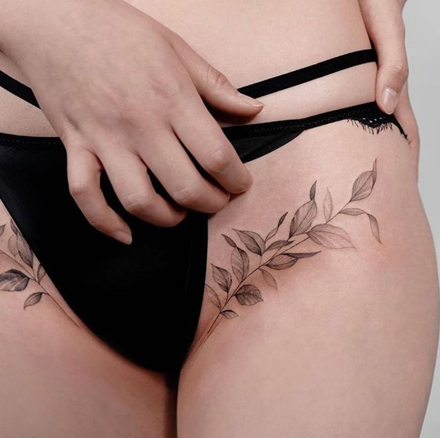 Eve's Leaves Reimagined in Grayscale Tattoo Design