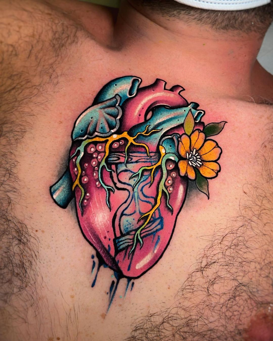 Realistic Blue-Pink Human Heart Tattoo Designs for the Raw Soul