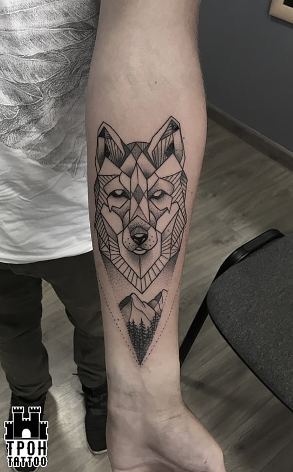 Textured Geometric Wolf Tattoos with Mountains