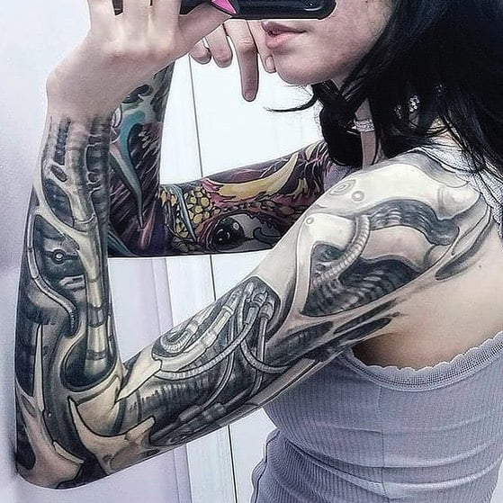 Female Biomechanical Arm Tattoo in Grayscale