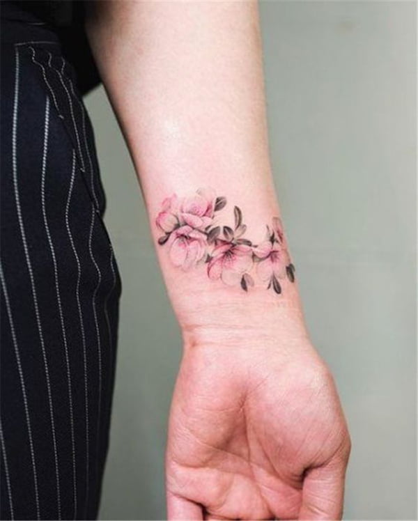 Small Pastel Cherry Blossom Tattoo