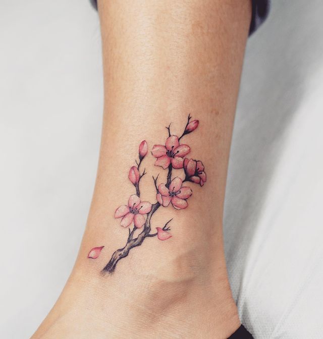 The Tiny Cherry Blossom Flower Tattoo