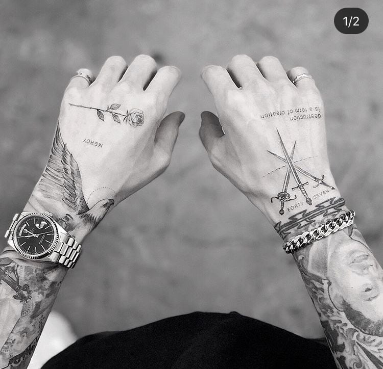 Hand Tattoos by tattoo artists