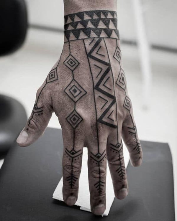 Tribal Tattoo On Hand And Finger