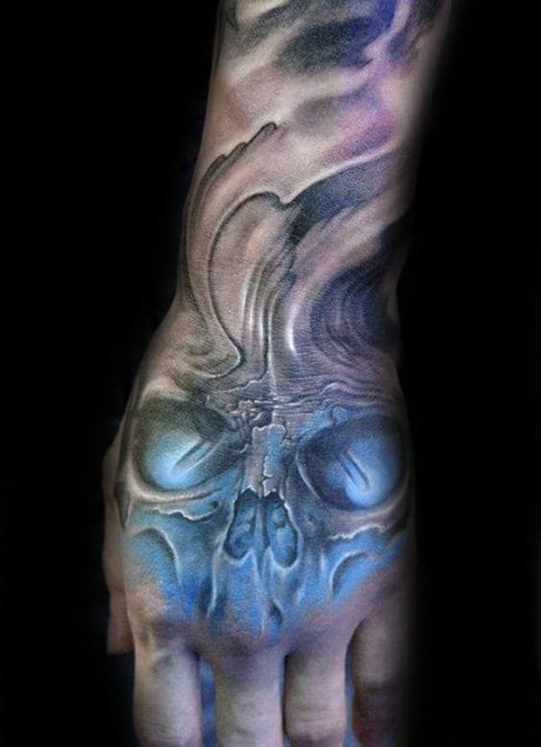 Haunting Blue Skull Hand Tattoo, tattoo inspiration
