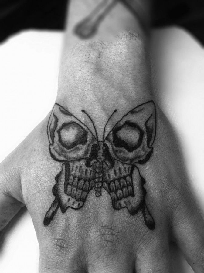 Butterfly Skull Black Hand Tattoo