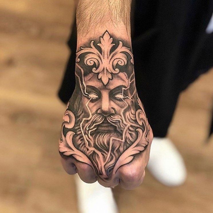 Black and White Zeus Hand Tattoos