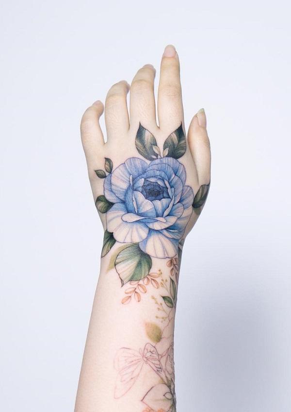 Powder Blue Flower Hand Tattoos