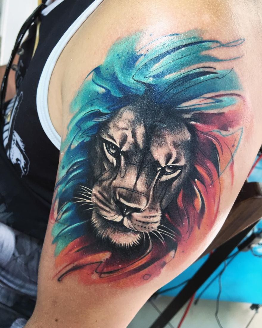 Lion Tattoo Ideas: Black, Blue, and Red Lion Tattoo
