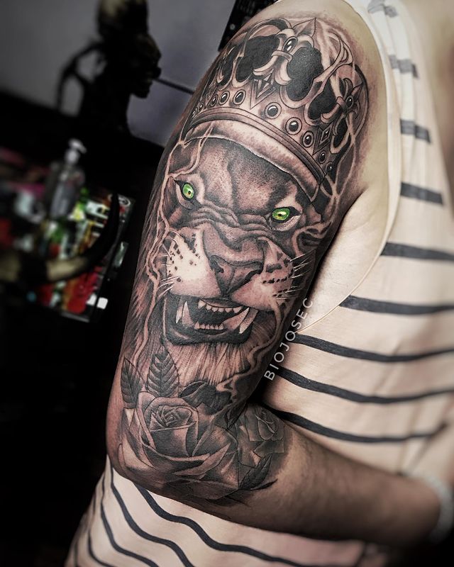 Lion Tattoos Idea: Green Eyed Lion with Crown Tattoo, Lion Eyes Tattoo