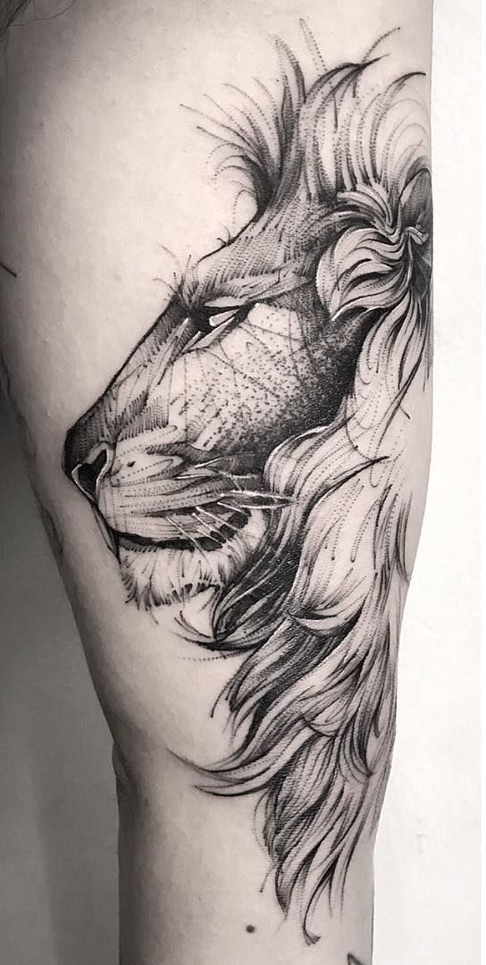 Lion Tattoo Ideas: Side Facing Lion Head Tattoo on Leg