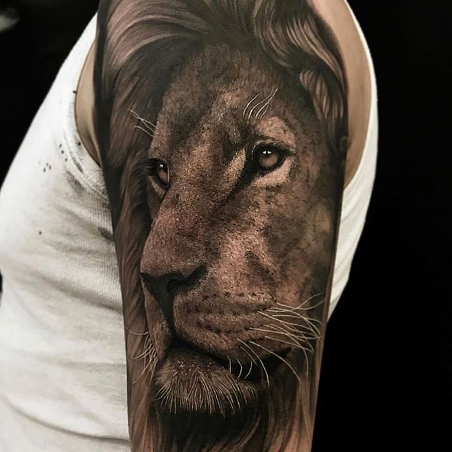 Lion Tattoo Ideas: Realism Style Lion Head Tattoo in Grayscale