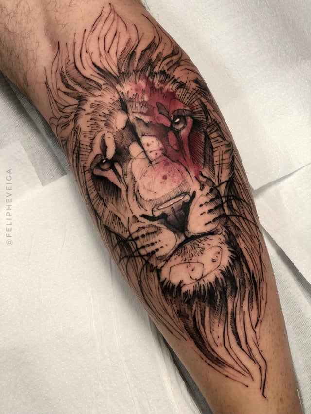 Lion Tattoo Ideas: Large Lion Head Tattoo with Subtle Coloring