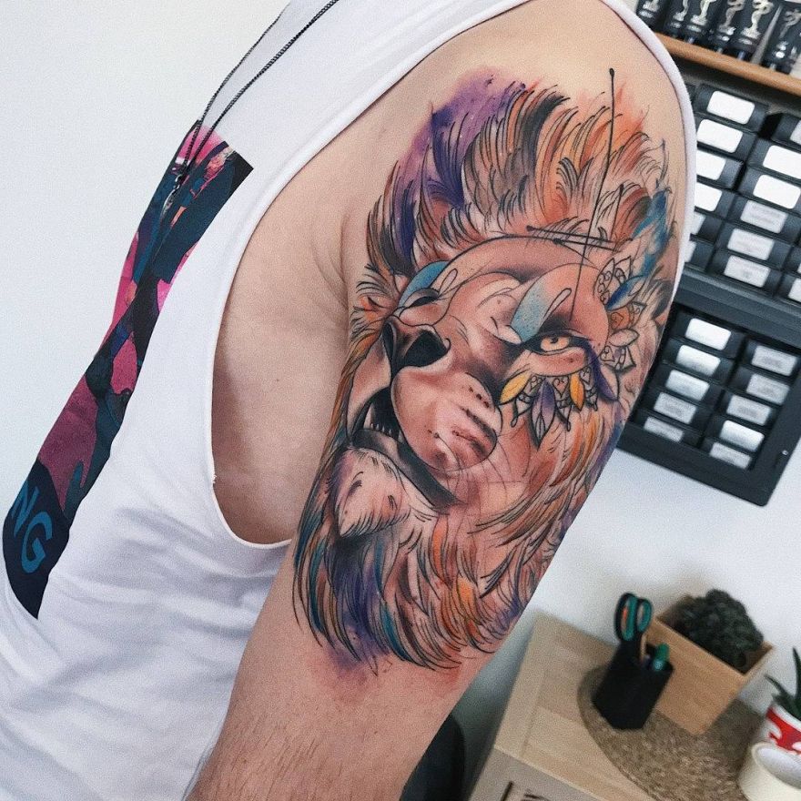 Lion Shoulder Tattoo: Multi Hued Watercolor Lion Head Tattoo by Tattoo Artist