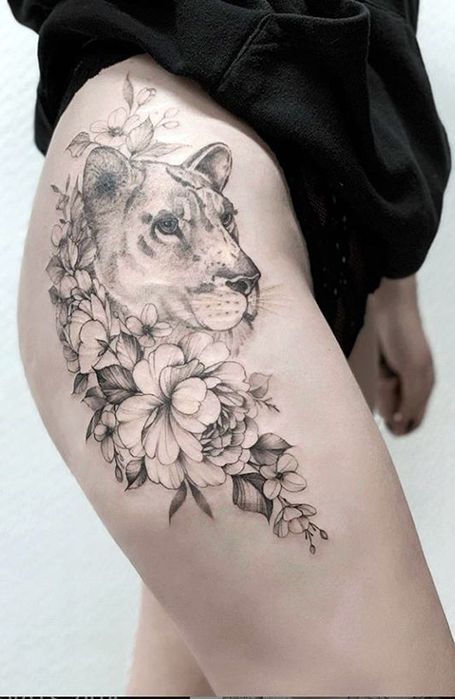 Grayscale Lioness and Flowers Hip Tattoo