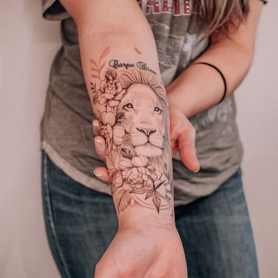 Forearm Lion Tattoo with Clock and Flowers