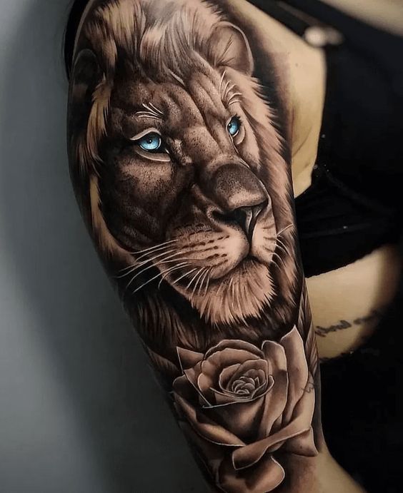 Realistic Lion Head Tattoo with Blue Lion Eyes Tattoo